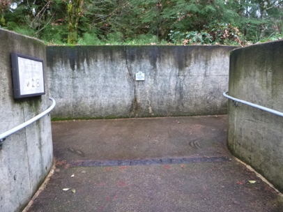 Entrance into the Salmon River underwater viewing area – wide paved walkway – cement walls with handrail